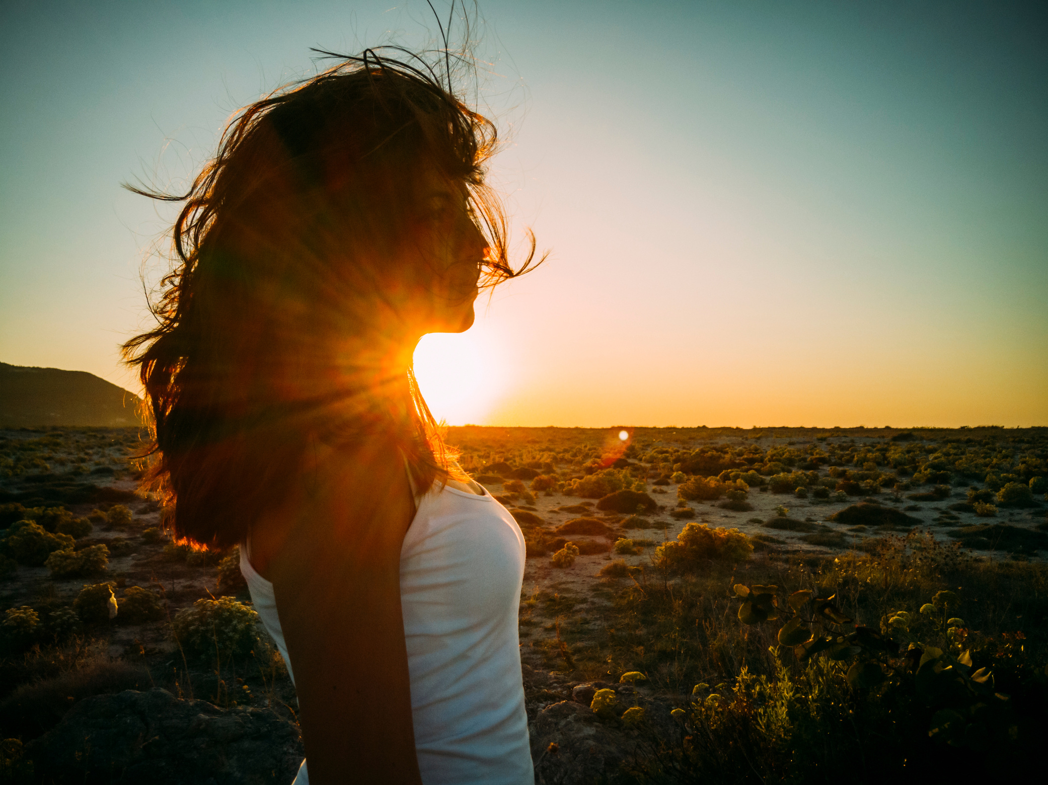 Woman with Blowing Hair at the Beach