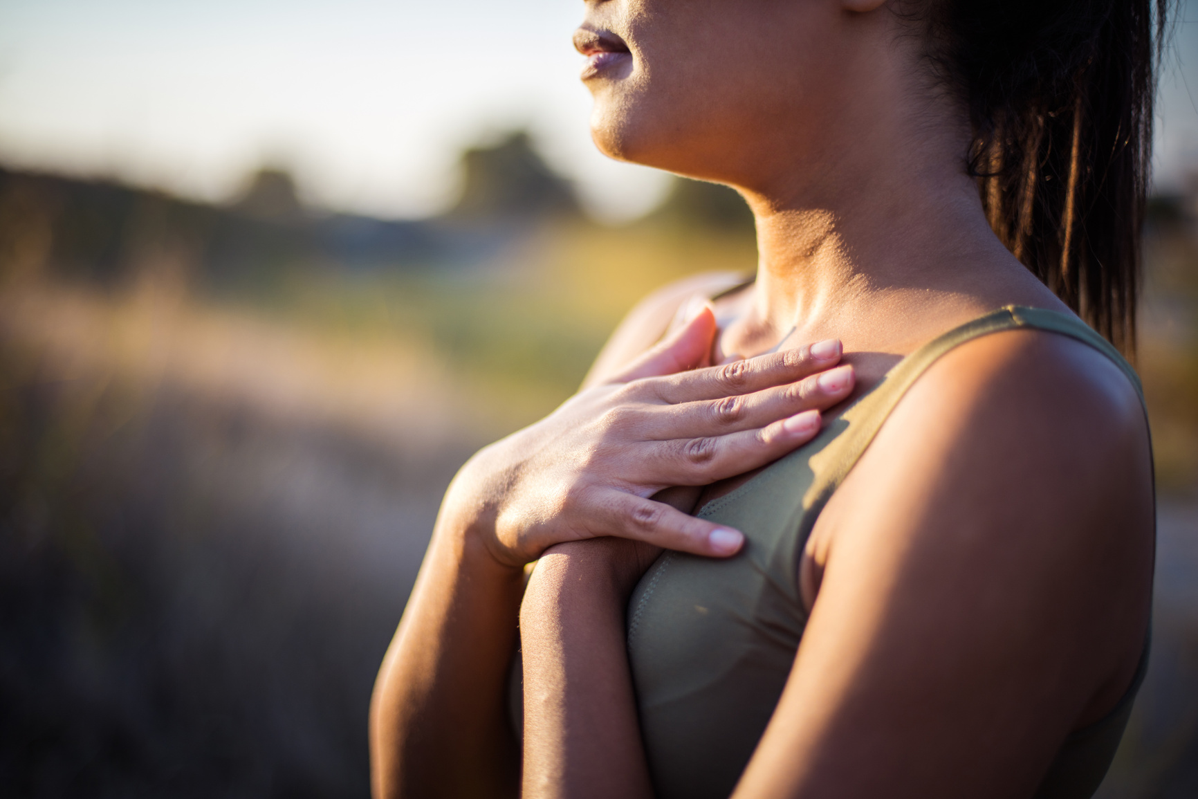 Young woman practicing breathing yoga.